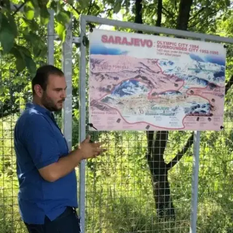 Adis explaining the map of the Siege of Sarajevo at the Tunnel of Hope Museum.